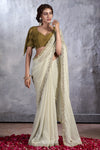 Cream Bandhani Design Saree With Alluring Blouse