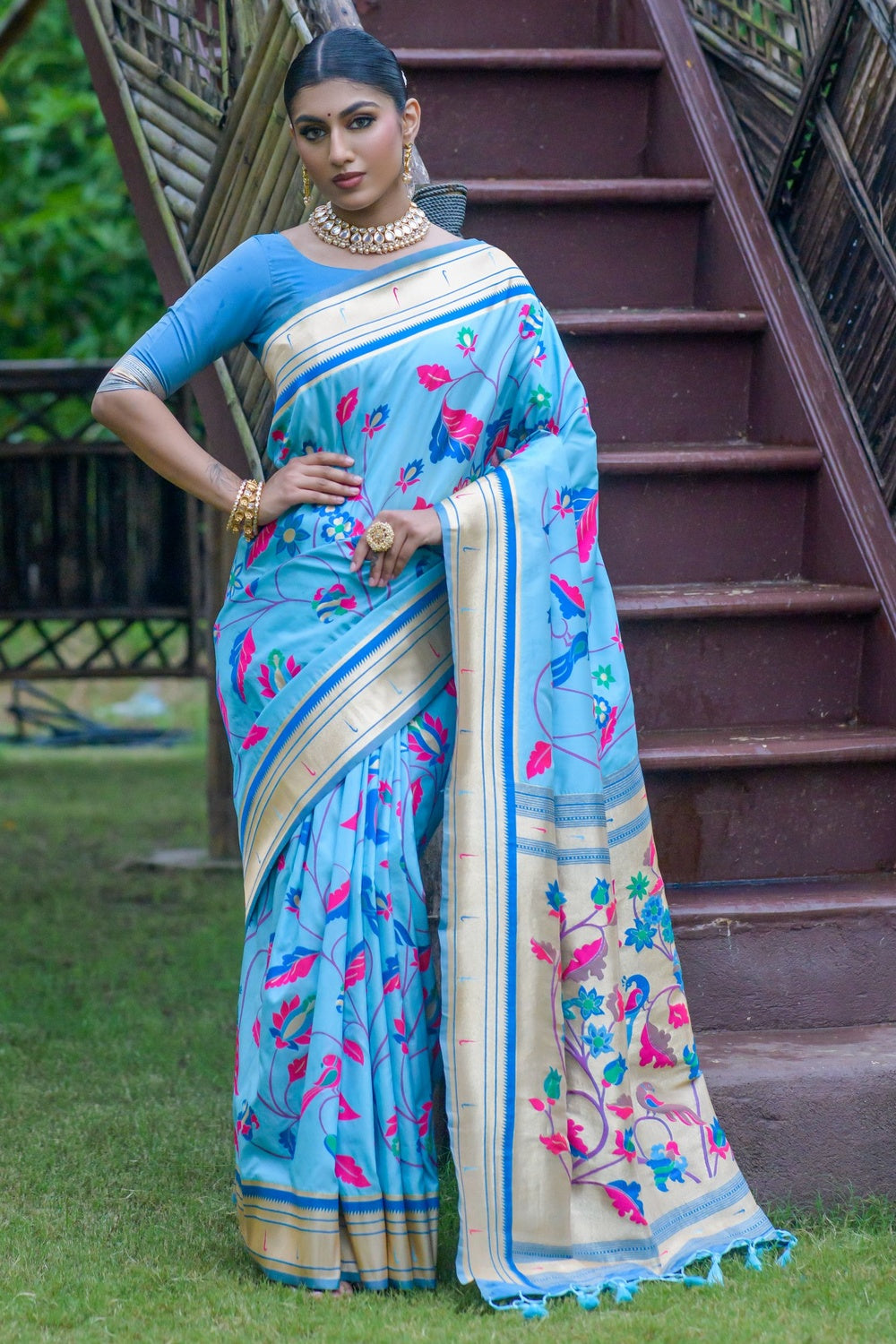 Premium Photo | A beautiful Indian maiden in a royal blue Paithani saree  showcasing grace and tradition on a white b...