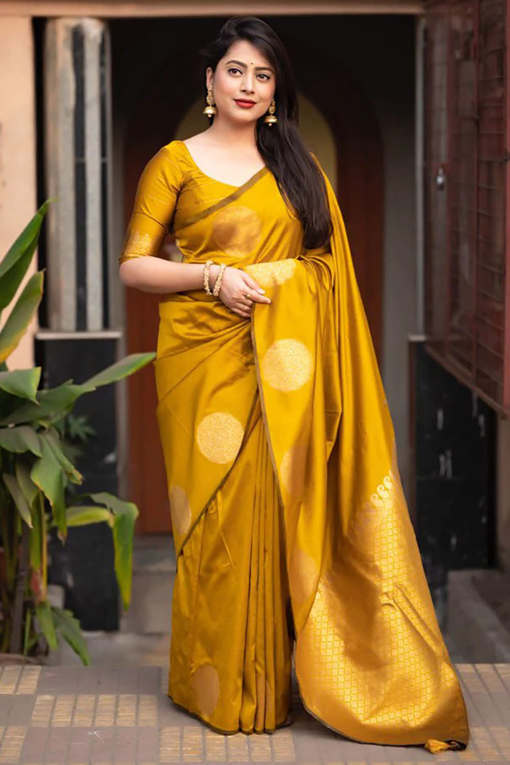 Bright Yellow Silk Saree With Zari Weaving Work