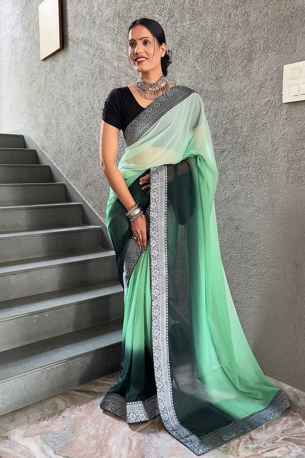 Green Georgette Saree With Zari Weaving Border