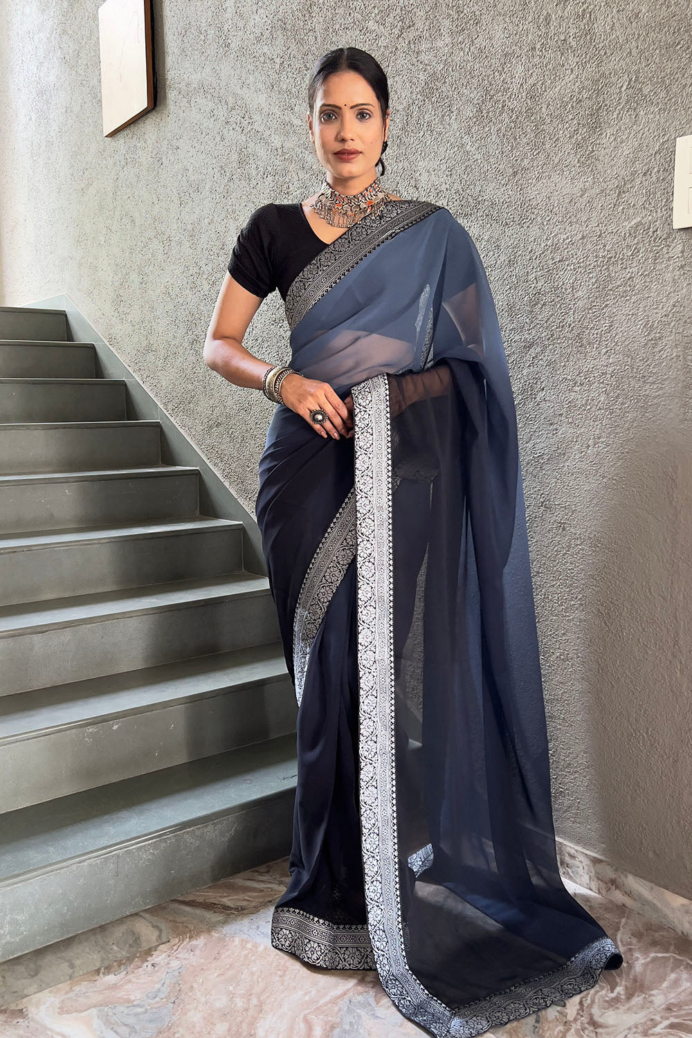 Grey Georgette Saree With Zari Weaving Border