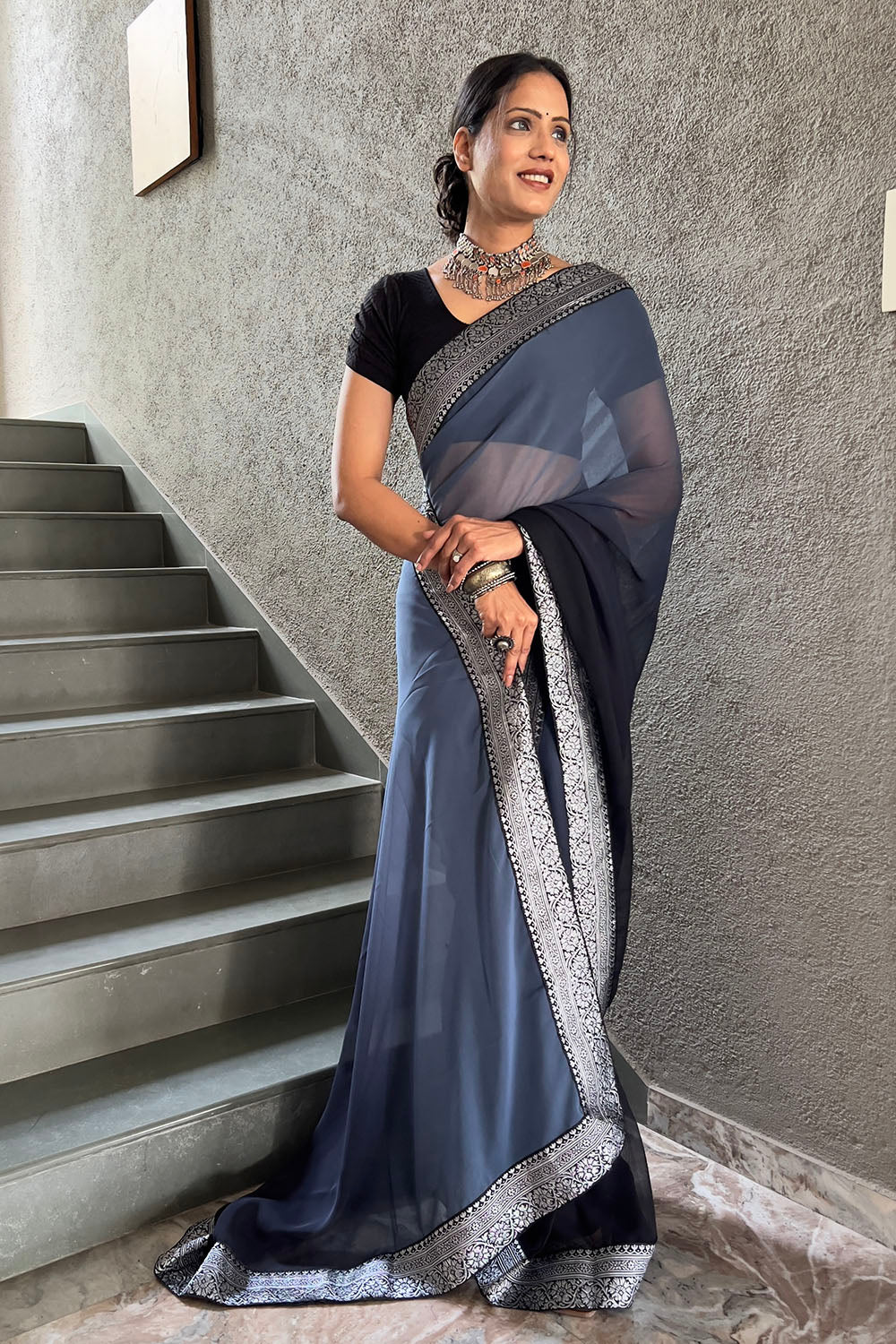 Grey Georgette Saree With Zari Weaving Border