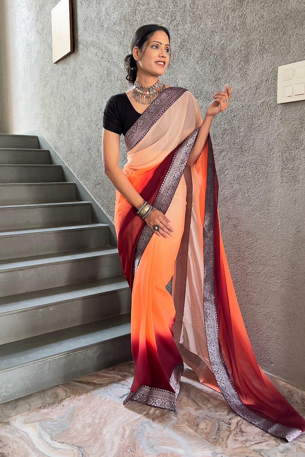 Maroon &amp; Orange Georgette Saree With Zari Weaving Border