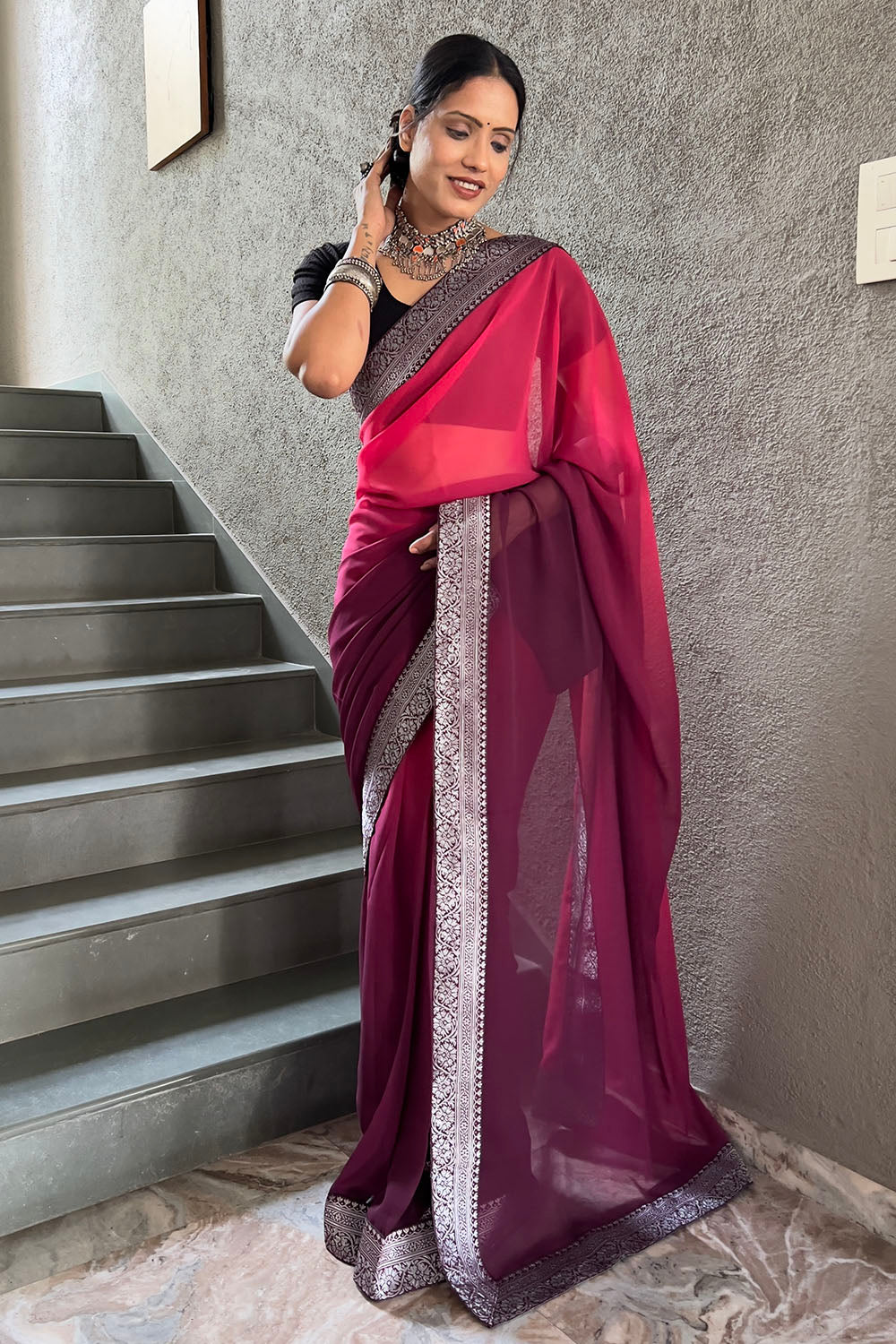 Wine Georgette Saree With Zari Weaving Border