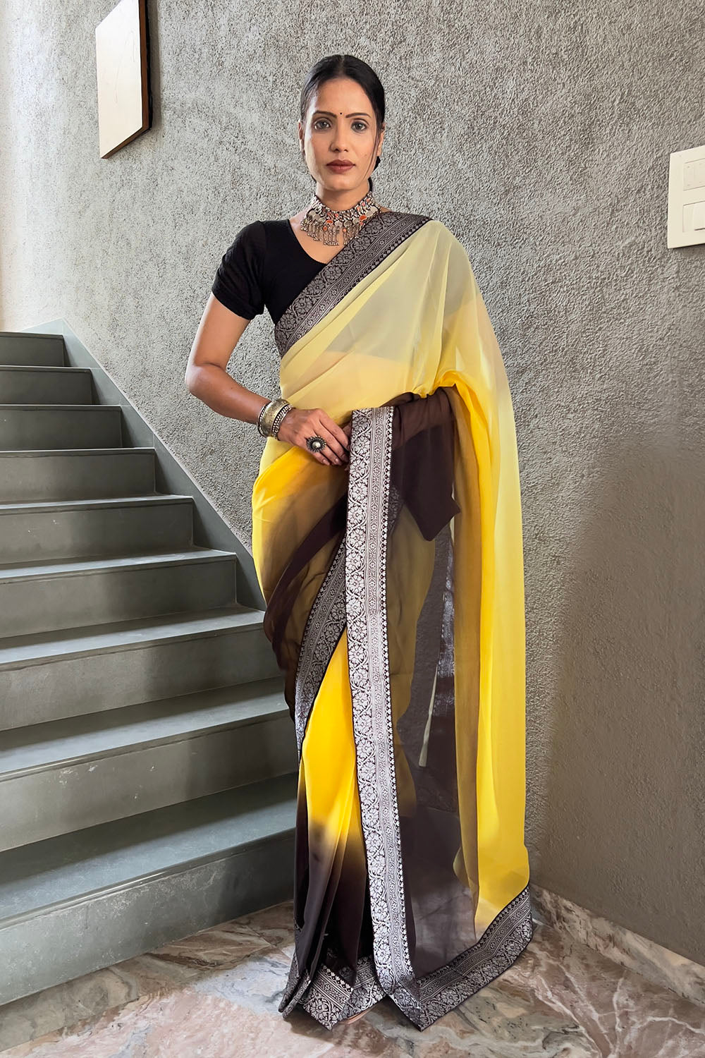 Yellow Georgette Saree With Zari Weaving Border