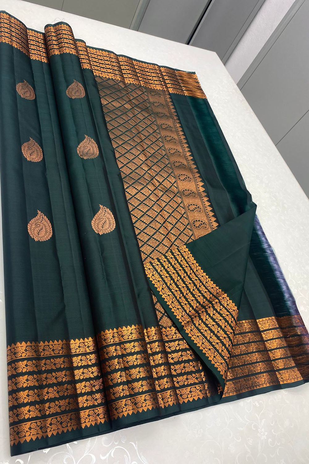 Dark Green Banarasi Silk Saree With Zari Weaving Work