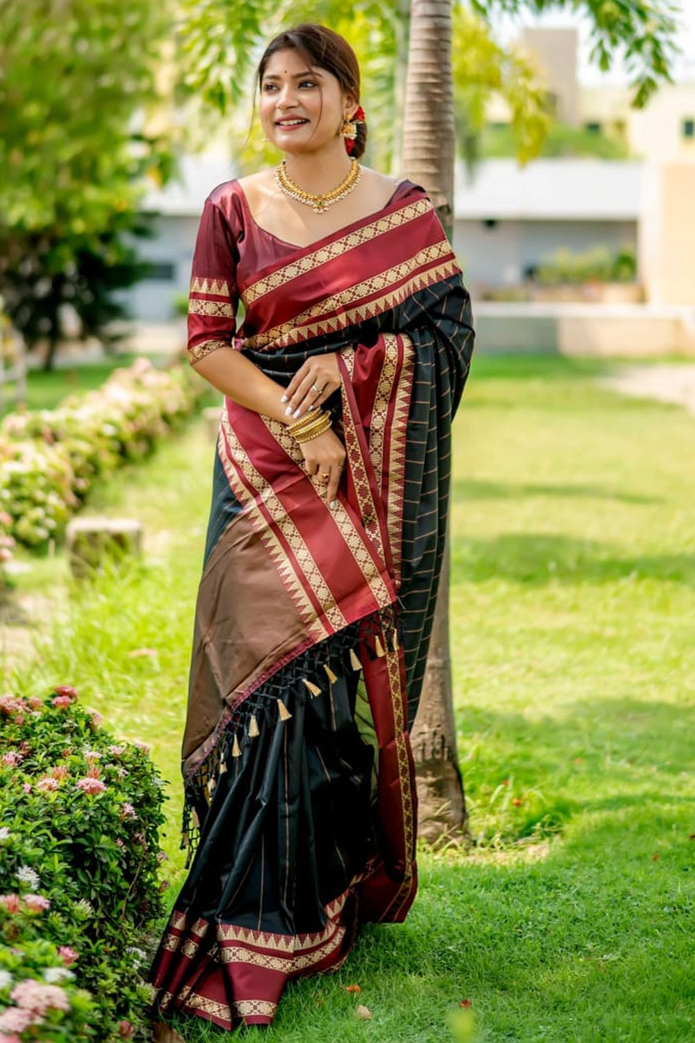 Maroon Colour Saree With Dense Aari Jaal On Pallu And Flowral Motifs.