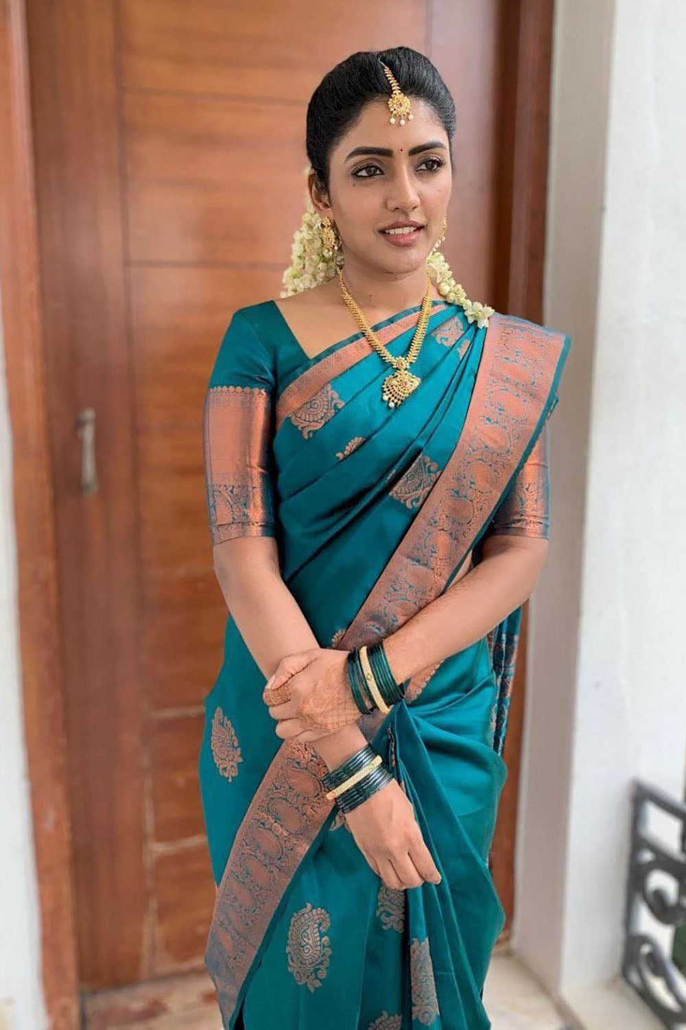 Teal Blue Banarasi Silk Saree With Zari Weaving Work