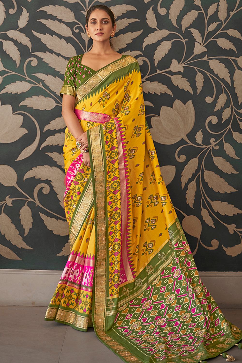 Mustard yellow color patola silk saree with woven design