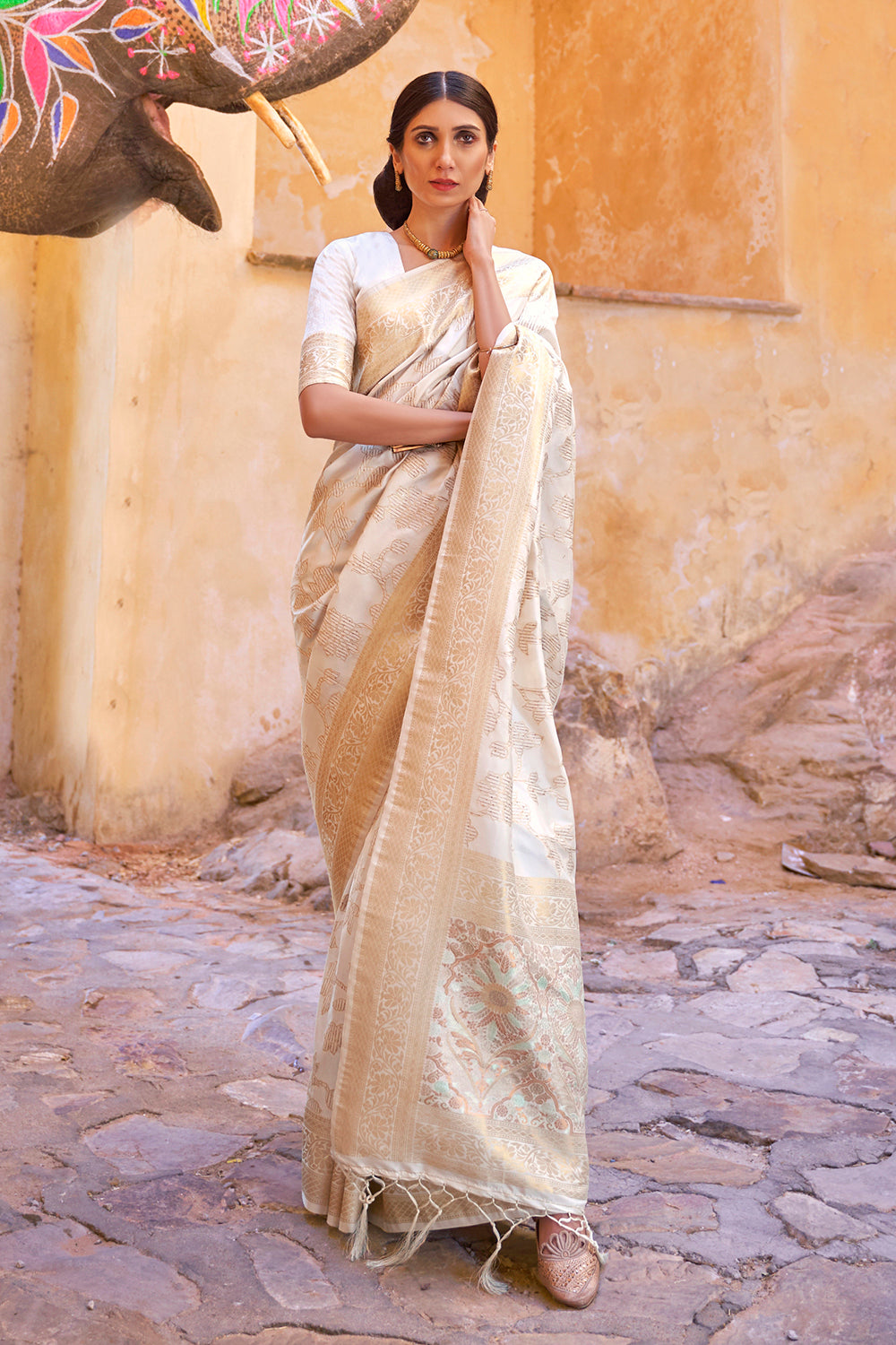 Twirling Off White Soft Banarasi Silk Saree With Panoply Blo